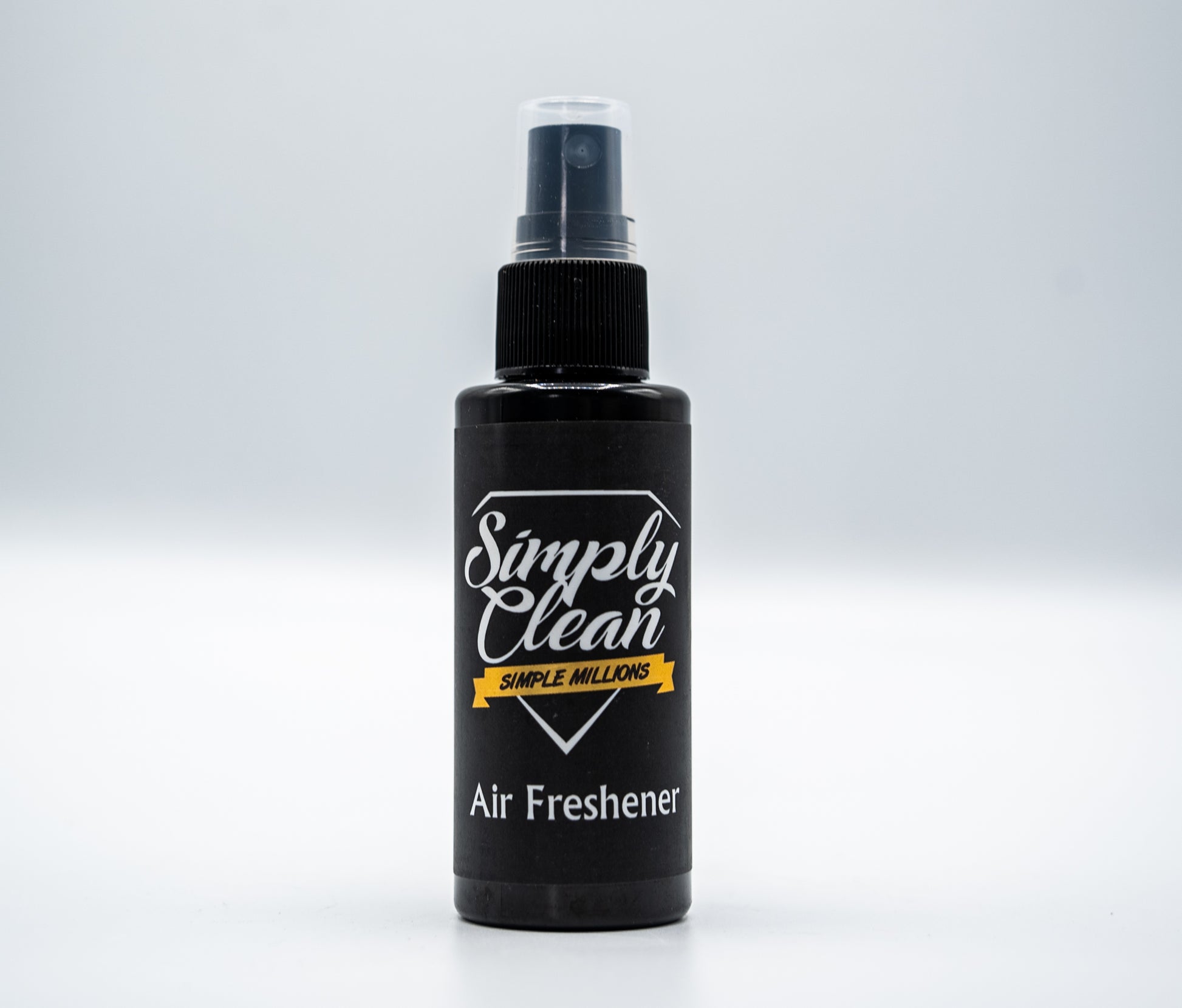Simple Millions Air Freshener 2 oz Black Bottle black label Image. 